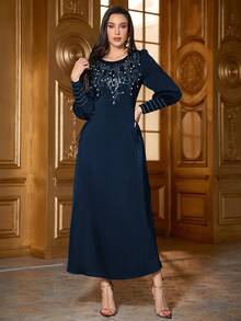 Damska, jednokolorowa, elegancka, długa sukienka arabska z okrągłym dekoltem i długim rękawem, zdobiona kryształkami, perłami i wiązaniem w talii, miękka i wygodna, odpowiednia na festiwale, na co dzień i na co dzień