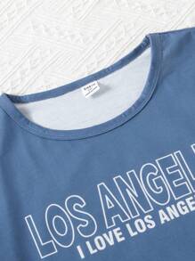 青少年男孩寬鬆版式2入組休閒居家服,特色為字母印花短袖t恤和橡筋腰帶長褲