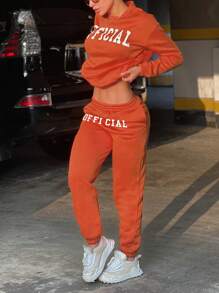 LovelyWholesale Bộ áo nỉ dài tay hở vai cổ tròn in chữ và quần dài giản dị cho nữ vào mùa thu đông - trái cam - Xem 1