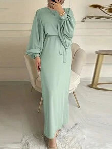 Đầm dài tay cổ tròn, màu trơn, tay phồng, ôm dáng, kín đáo dành cho nữ, kiểu dáng thanh lịch mùa xuân. - màu xanh lá - Xem 3