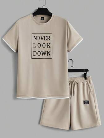 Manfinity RebelGame Conjunto De Top De Manga Corta De Cuello Redondo Con Pantalones Cortos De Cintura Elástica Con Cordón Y Bolsillos Con Eslogan Impreso