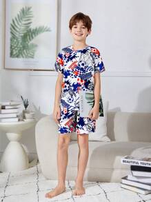 SHEIN Leap Crew Cậu bé Tween Giải trí Bóng đá Mẫu Vòng cổ Ngắn tay Áo thun Và Quần short Nhà  Mặc 2 Miếng Bộ - Xanh và trắng - Xem 5