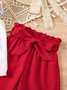 SHEIN Conjunto de 2 piezas con blusa de cuello redondo y estampado floral, y pantalones con cintura paper bag para niñas jóvenes - Multicolor - Ver 3