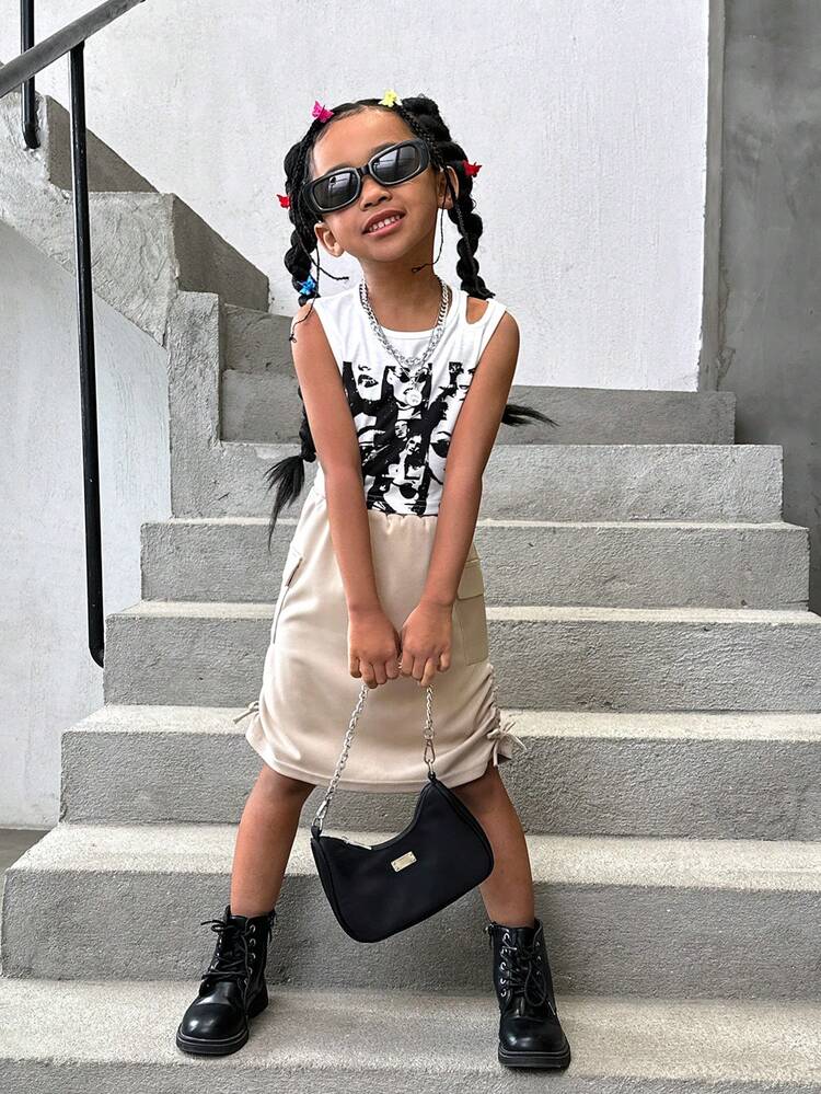 Young Girls' Printed Hollow Out Vest And Drawstring Pleated Skirt Set