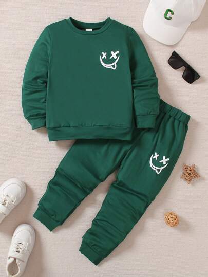 SHEIN Playful Pals 男童純色口袋運動服套裝,表情印花設計