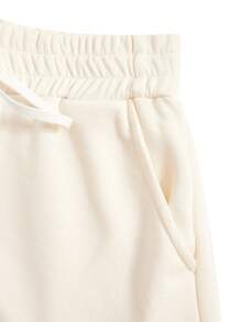 SHEIN Essnce Conjunto top tank unicolor con shorts track