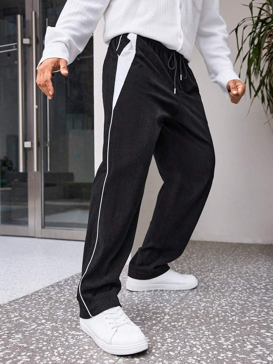 Manfinity Hypemode Quần cạp rút dây màu khối lớn cho nam, vải nhung kẻ - màu đen - Xem 1