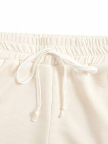 SHEIN Essnce Conjunto top tank unicolor con shorts track