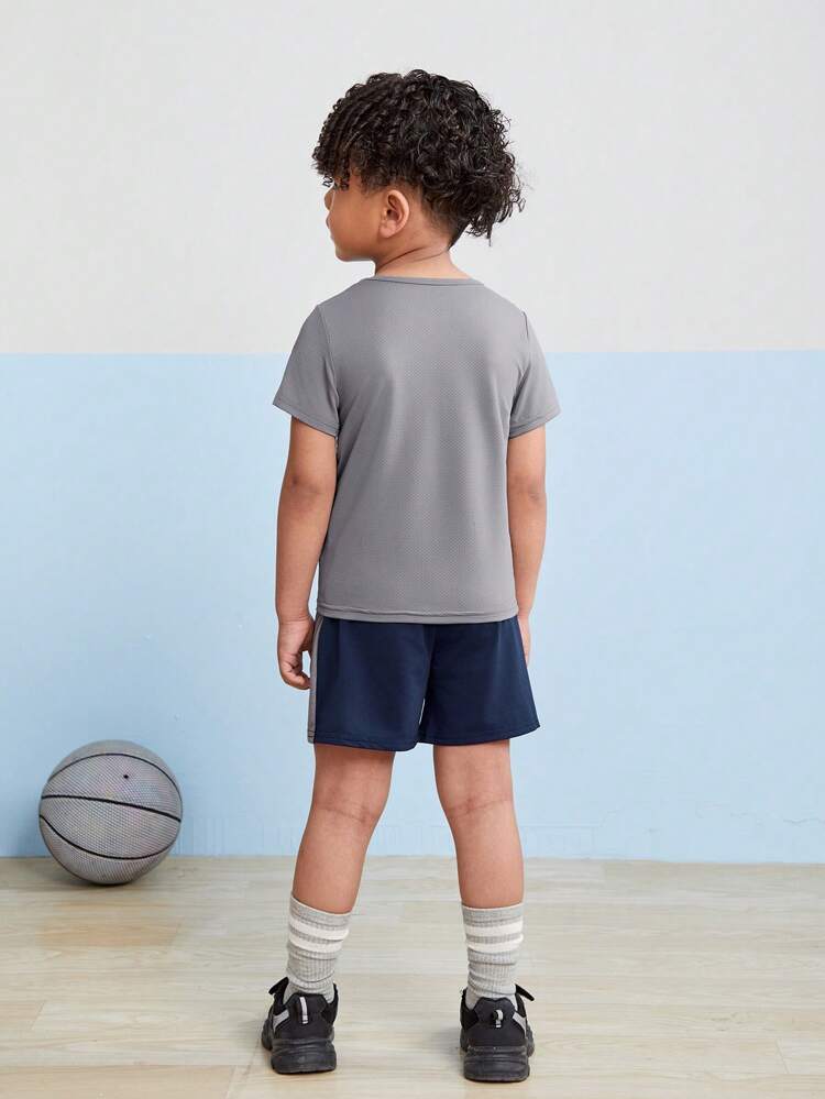 Young Boys Solid Color Round-Neck T-Shirt And Contrast Color Athletic Shorts