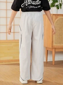 SHEIN Tween dziewczynka Luźny, casual Koreański Styl Kolorowe bloki Joggersy Z Elastyczny Pasek w talii & Litera Nadrukowany , Codzienna odzież