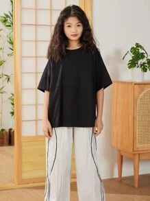 SHEIN Oversized Komfortables Rundhals-T-Shirt mit Drop Shoulder und geteiltem Design mit Buchstaben-Muster für Tween Mädchen