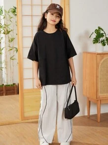 SHEIN Oversized Komfortables Rundhals-T-Shirt mit Drop Shoulder und geteiltem Design mit Buchstaben-Muster für Tween Mädchen