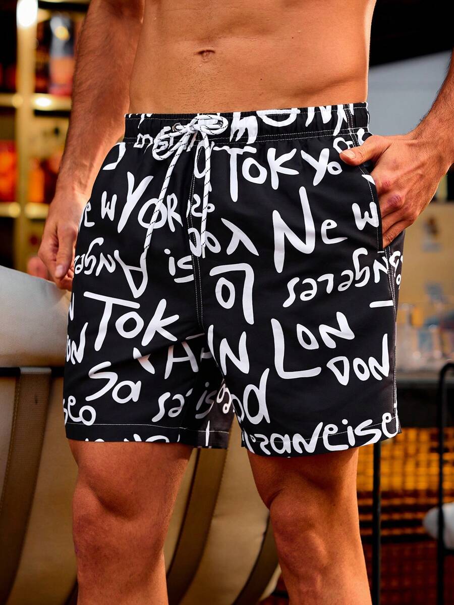 Manfinity Swimmode Men's Full Letter Printed Drawstring Beach Shorts,Hawaiian