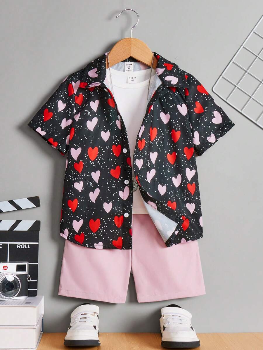 SHEIN Juego De Camisa De Manga Corta Con Estampado De Corazones Lindos Y Pantalones Cortos De Un Solo Color Para Niños Jóvenes - Rosa - Ver 1