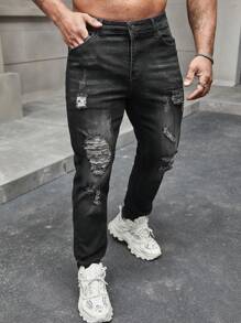 Manfinity LEGND Męskie jeansy slim fit z przetarciami i wąsami Długie postrzępione dżinsy Cargo Zwykły czarny Party Grunge