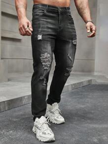 Manfinity LEGND Męskie jeansy slim fit z przetarciami i wąsami Długie postrzępione dżinsy Cargo Zwykły czarny Party Grunge