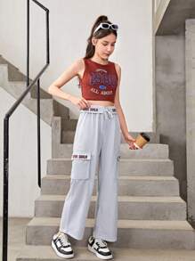 Conjunto De Top Deportivo Estampado Y Pantalones Deportivos Con Bolsillo Y Cordón Para Chicas Adolescentes Que Prefieren Un Estilo Deportivo Y Cómodo