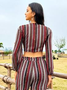 Soleia بلوزة مطبعة عتيقة بأكمام طويلة و مقصوصة بعقدة في الأمام