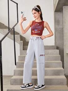 Conjunto De Top Deportivo Estampado Y Pantalones Deportivos Con Bolsillo Y Cordón Para Chicas Adolescentes Que Prefieren Un Estilo Deportivo Y Cómodo