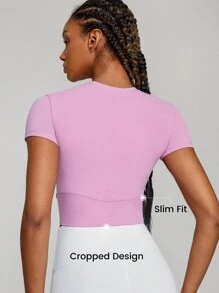 GLOWMODE FeatherFit™ Crossover Hem Studio Cropped Tee Light Support Low Impact Yoga Pilates Studio - Pink - View 2