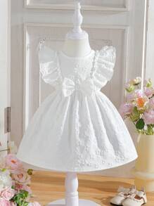 SHEIN Baby Girl Solid Color Floral Jacquard Dress With Ruffled Hem And Bow Decorations