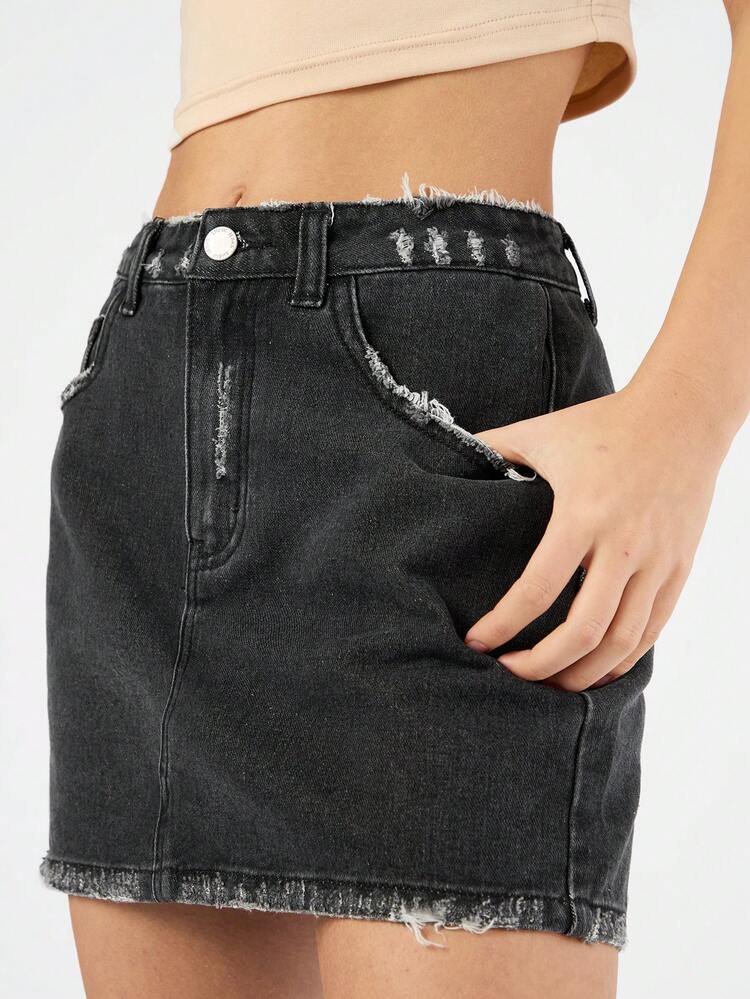 Straight Denim Skirt With Oblique Pockets And Fringed Hem