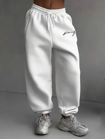 Manfinity Hypemode Herren Jogginghose mit Kordelzug und Buchstaben-Muster, weite Jogginghose, als Geschenk für Ehemann oder Freund