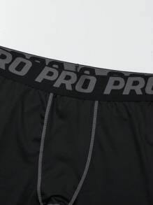 Gym Rark Leggings de sport élastiqués avec bande jacquard de lettres bicolores, style petit ami pour hommes - Noir - Voir 7