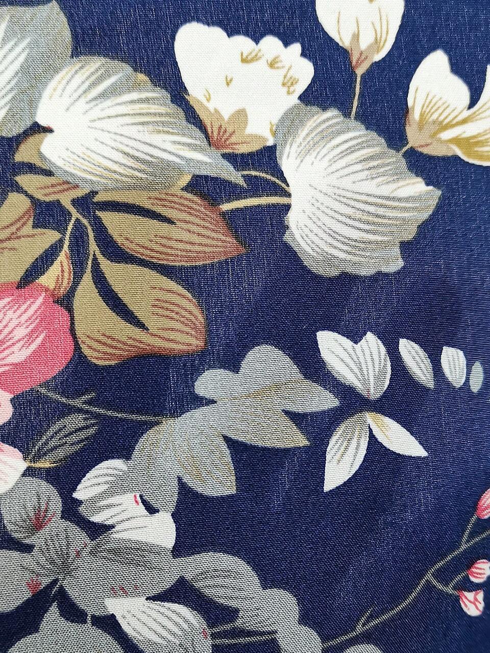 Notched Collar Short Sleeve Blouse With Floral Print And Flared Hem