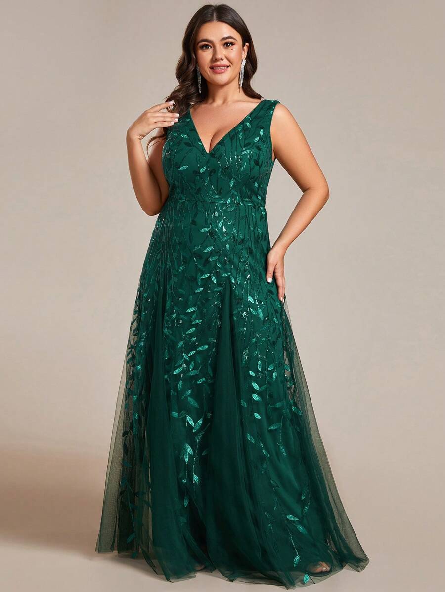Vestido formal con cuello en V profundo, contraste de color con lentejuelas y malla