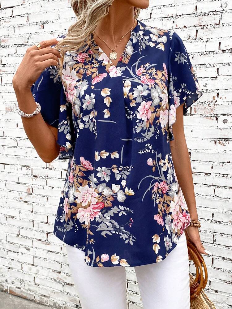 Notched Collar Short Sleeve Blouse With Floral Print And Flared Hem
