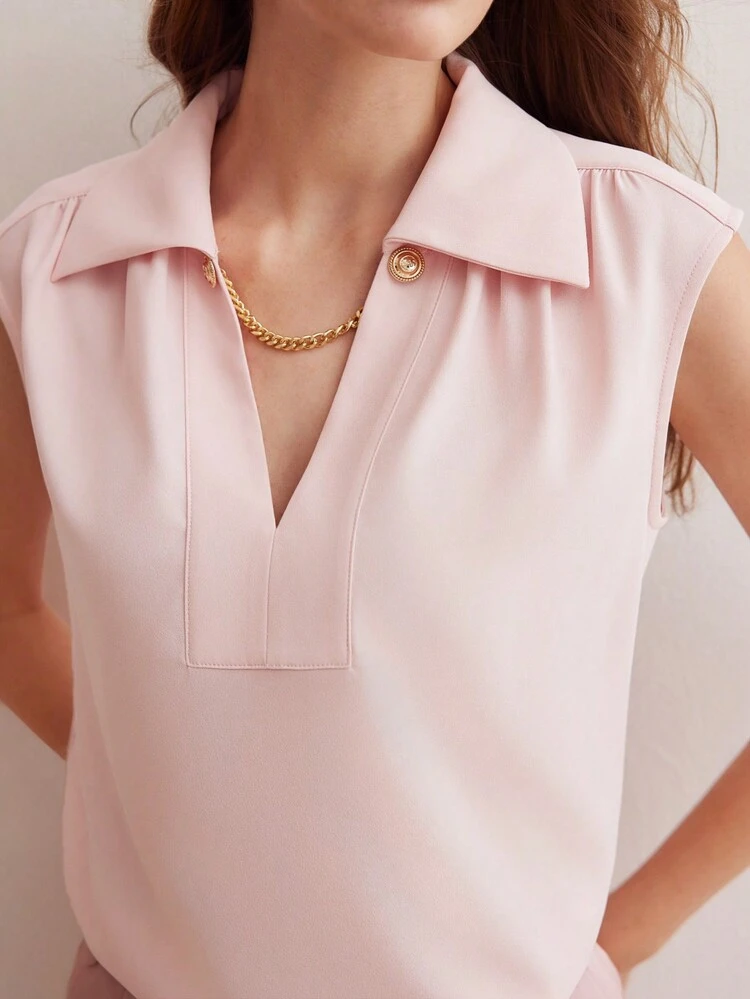 SOLID V-COLLAR SLEEVELESS BLOUSE