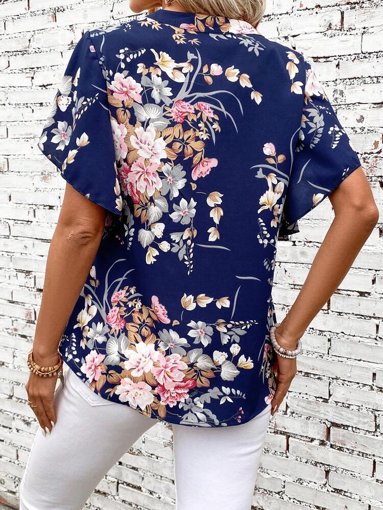 Notched Collar Short Sleeve Blouse With Floral Print And Flared Hem