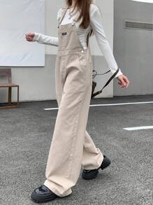 DAZY 女性寬鬆牛仔工裝背帶褲,帶有補丁細節