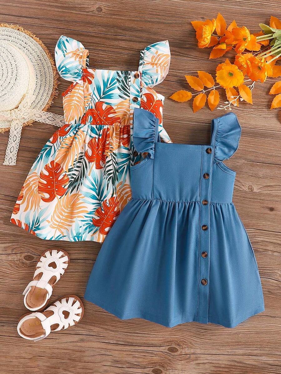 SHEIN Vintaside Kids Juego de 2 vestidos para niña pequeña, de moda con estampado de hojas, detalles de botones y ribetes de volantes sin mangas y vestido sólido para vacaciones de verano - Multicolor - Ver 1