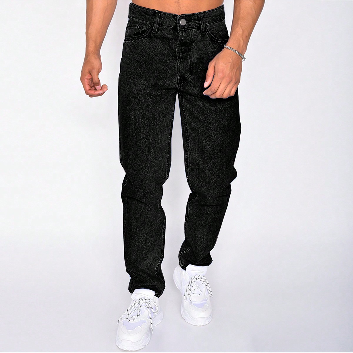 Jeans informales de hombre con bolsillo sesgado y pernera entallada con efecto desgastado
