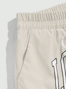 ROMWE MEN Prep Men's Letter Graphic Drawstring Waist Shorts, School - Apricot - View 3