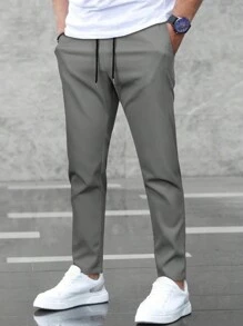 Manfinity Homme 男士纯色抽绳腰斜口袋长裤，适合秋季