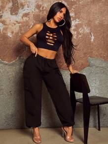 SHEIN SXY Conjunto de top y pantalones de dos piezas para mujer, con estilo boho fashion para festival de música. El top tiene diseño hueco, mangas largas de punto negro, costuras laterales y detalles en el pecho, con efecto desgarrado y sexy, ideal para vacaciones elegantes. Los pantalones tienen cintura alta, varios bolsillos, cintura elástica y diseño holgado de boca larga. - Negro - Ver 6