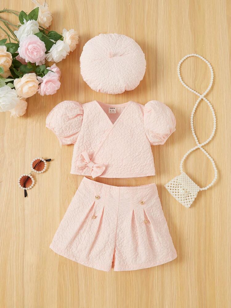 Baby Girl Solid Color Textured Short Sleeve Top, Shorts And Hat Set With Bow Decoration