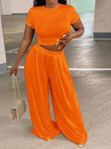 Slaydiva Conjunto De Camiseta De Manga Corta De Cuello Redondo En Color Sólido Y Pantalones Para Mujer