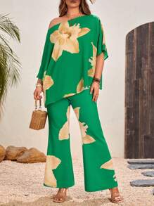 SHEIN VCAY Plus Size Floral Printed Asymmetrical Neckline Top And Flared Pants Two-Piece Set