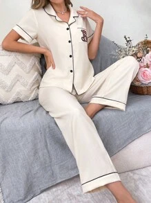 CoupledUp Conjunto de pijama con bloqueo de color y bordado de oso de bolsillo - Albaricoque - Ver 3