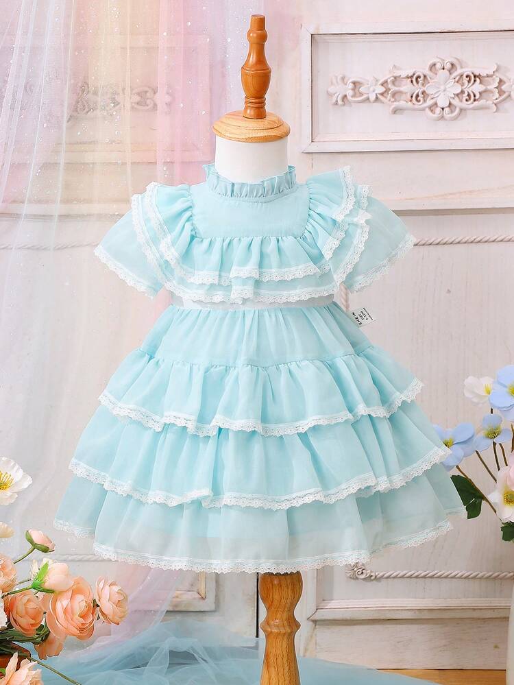 Stylish Baby Girl's Lace And Ruffle Trimmed Patchwork Dress With Decorative Trim