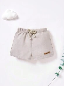 SHEIN Em bé Con trai Trang trí Patch Eo đàn hồi Giải trí Quần short - Màu be - Xem 5