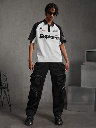 Manfinity RebelGame قميص بولو محبوك للرجال عارض ومريح بطبعة حرفية