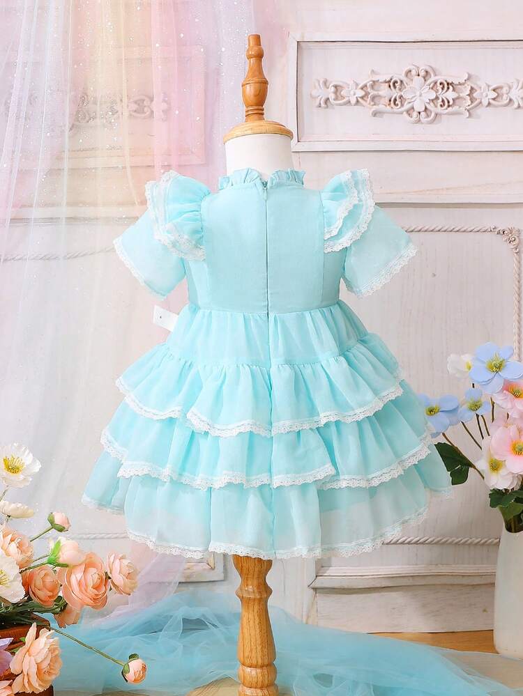 Stylish Baby Girl's Lace And Ruffle Trimmed Patchwork Dress With Decorative Trim