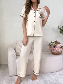 CoupledUp Conjunto de pijama con bloqueo de color y bordado de oso de bolsillo - Albaricoque - Ver 6