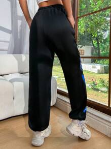 Lunelith SHEIN Lunessa Pantalones Jogger De Parches Con Estampado De Bloque De Color Y Relámpagos