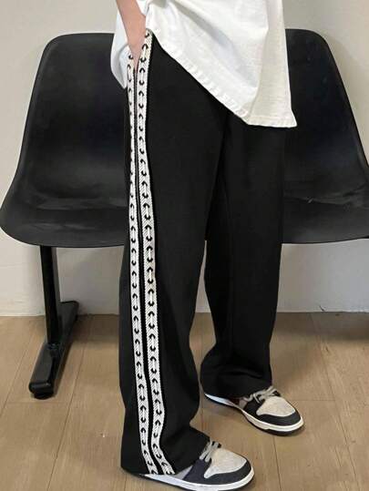 SHEIN Pantalon décontracté droit pour garçons préadolescents de grande taille avec une coupe ample et des détails de rayure latérale